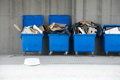 Team member arranging recyclable items during a house clearance in Redhill